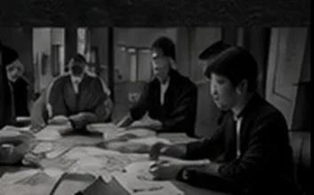 図面を囲む打ち合わせ